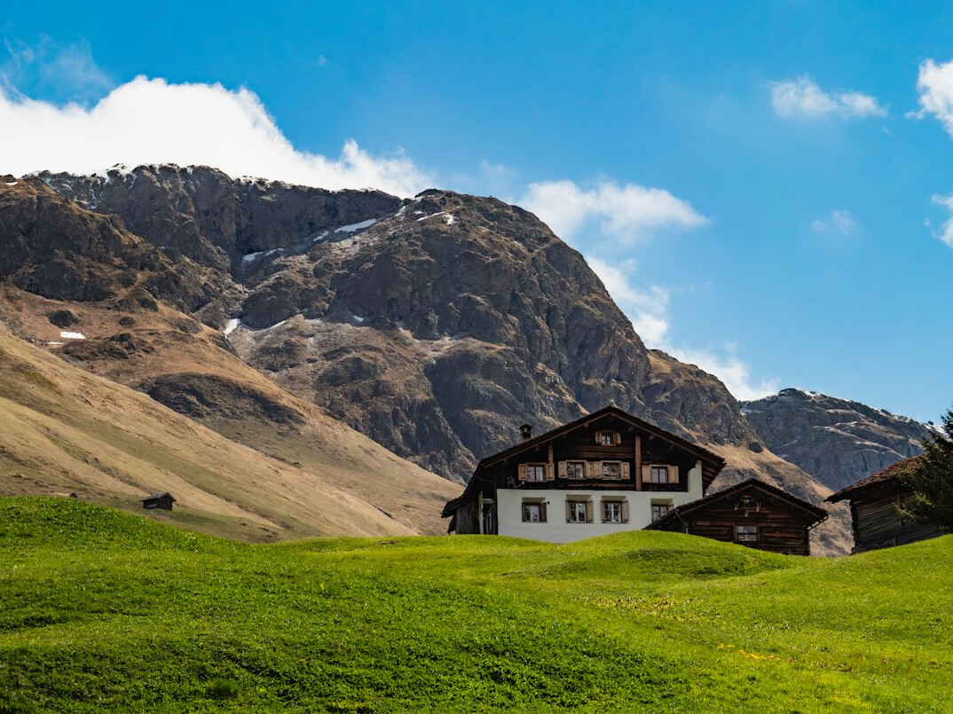 Traditional Swiss wooden chalet villa exterior in the Alps